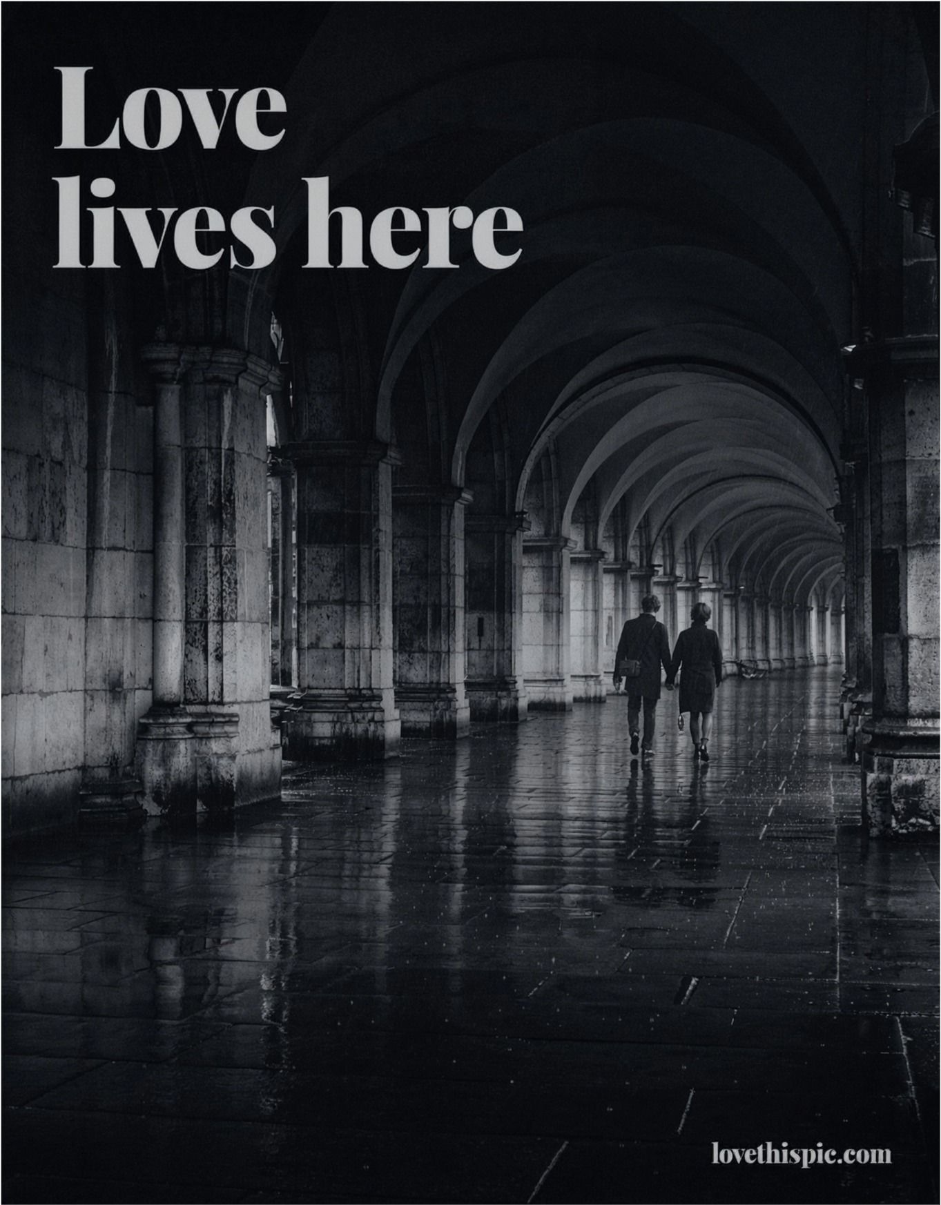 Love Lives Here Couple Walking Under Stone Arches